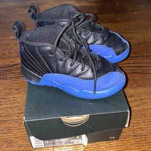 Black and blue Jordan 12 retros